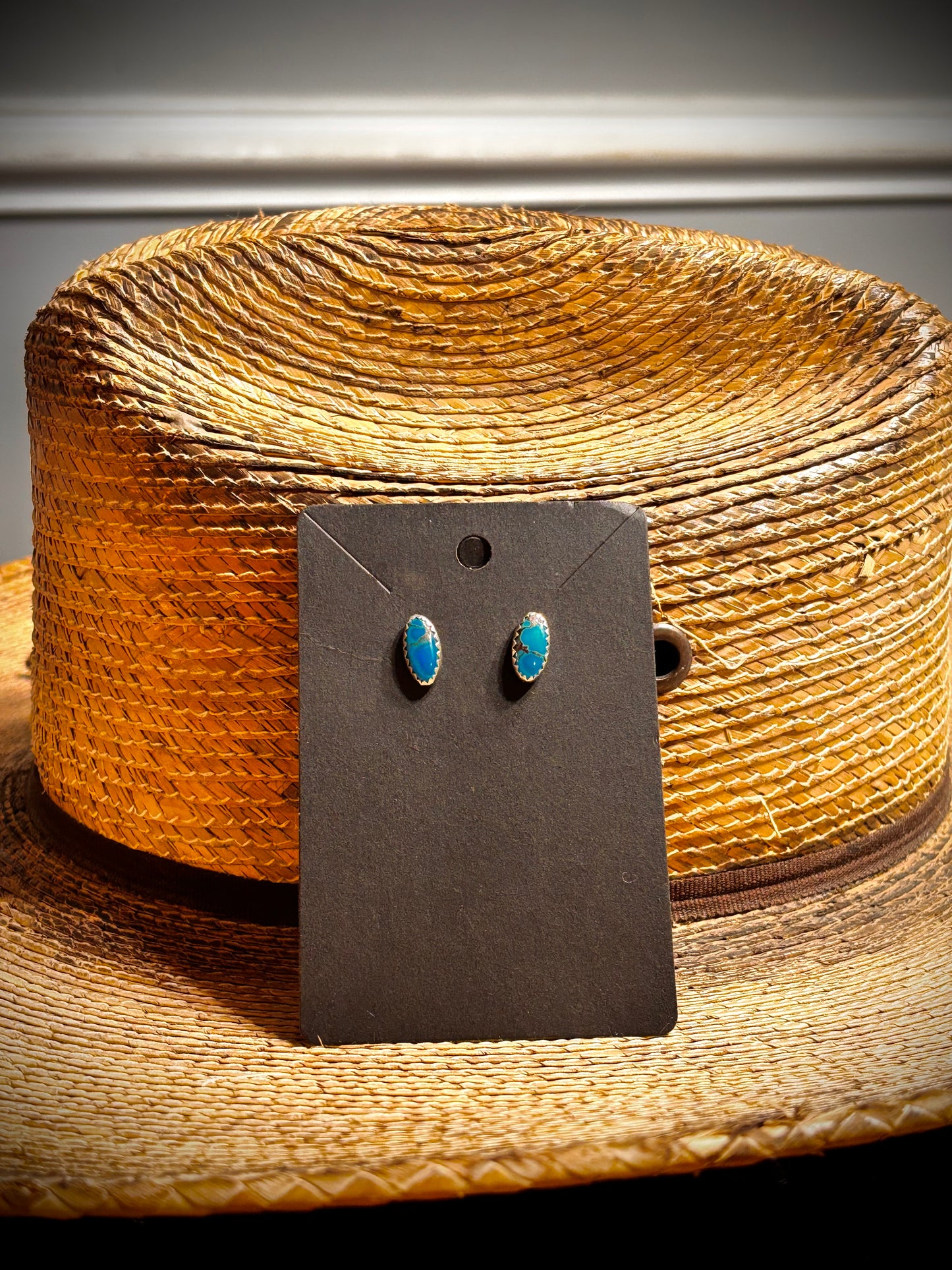 Small Egyptian turquoise studs.
